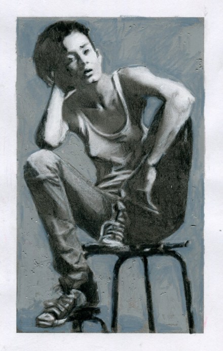 seated-woman-wearing-chucks-sneakers